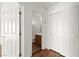 Hallway view showcasing access to the bathroom and closet space, enhancing the home's functionality at 6029 Mustang Breeze Trl # 101, Henderson, NV 89011