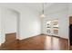 Open living room with doors to balcony at 6029 Mustang Breeze Trl # 101, Henderson, NV 89011