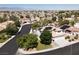 Expansive aerial view of a neighborhood showcasing many well-maintained homes with solar panels at 6313 Giant Oak St, North Las Vegas, NV 89084
