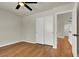 Bedroom featuring hardwood floors and sliding closet doors at 6313 Giant Oak St, North Las Vegas, NV 89084