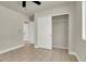 Bedroom featuring a closet, tile floors and a window letting in natural light at 6313 Giant Oak St, North Las Vegas, NV 89084