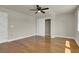 Bedroom featuring hardwood floors, closet and a window offering natural light at 6313 Giant Oak St, North Las Vegas, NV 89084