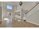 Spacious open-plan living room with tile floors, high ceilings, and abundant natural light at 6313 Giant Oak St, North Las Vegas, NV 89084