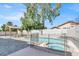 Backyard pool and spa with safety fence and gazebo at 6313 Giant Oak St, North Las Vegas, NV 89084