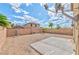 Spacious backyard with desert landscaping, patio and a block wall at 6381 Pronghorn Ridge Ave, Las Vegas, NV 89122