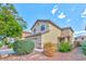 Charming two-story home with a two car garage, landscaped yard and a covered entry at 6381 Pronghorn Ridge Ave, Las Vegas, NV 89122