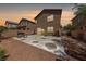 Cozy backyard with a concrete patio and barbecue, perfect for outdoor gatherings and relaxation at 6409 Dundock Ave, Las Vegas, NV 89122
