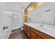 Bathroom with a double sink vanity and shower/tub combo at 6409 Dundock Ave, Las Vegas, NV 89122