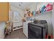 Well-equipped laundry room with modern washer and dryer at 6409 Dundock Ave, Las Vegas, NV 89122