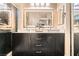 Modern bathroom boasts a dual sink vanity, stylish mirrors, and sleek fixtures at 6424 Strongbow Dr, Las Vegas, NV 89156