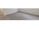 Neutral carpeted space showcasing natural lighting at 6749 Violet Cascade Ave, Las Vegas, NV 89156