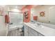 Clean bathroom with a glass-enclosed shower, white cabinets, and modern fixtures at 6918 Wrightshire St # 24, Las Vegas, NV 89166