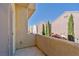 Balcony view of a residential street with multiple homes and trees at 7363 San Pablin St, Las Vegas, NV 89139