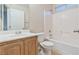 Bathroom featuring a tub/shower combo, single sink vanity, and tile flooring at 7363 San Pablin St, Las Vegas, NV 89139