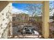 Balcony view of nearby building and parked cars, framed by architectural details at 7491 Speedwell Cavern St, Las Vegas, NV 89139