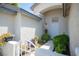 Inviting entryway featuring a decorative gate and a well-maintained walkway at 7500 Peaceful Brook St, Las Vegas, NV 89131