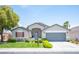 Charming single-story home with a well-manicured lawn and inviting curb appeal at 7500 Peaceful Brook St, Las Vegas, NV 89131