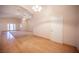 Bright living room showcasing wood floors, ceiling fans, and ample natural light at 7500 Peaceful Brook St, Las Vegas, NV 89131