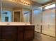 Bathroom with double sink vanity, and tiled shower tub combo at 7788 Soda Canyon St, Las Vegas, NV 89139