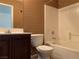 View of a standard bathroom with toilet, vanity, and shower/tub combination at 7788 Soda Canyon St, Las Vegas, NV 89139