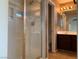 View of the bathroom featuring a glass-enclosed shower and vanity at 7788 Soda Canyon St, Las Vegas, NV 89139