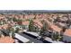 Aerial view of a residential community with well-maintained buildings and ample parking at 7905 Idledale Ct # 102, Las Vegas, NV 89145