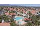 Aerial view of a lush residential community with pool, spa, and well-manicured landscaping at 7905 Idledale Ct # 102, Las Vegas, NV 89145