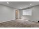 Bright bedroom featuring neutral walls, carpet flooring, recessed lighting, and a window at 7905 Idledale Ct # 102, Las Vegas, NV 89145