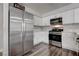 Gourmet kitchen featuring stainless steel appliances and quartz countertops at 7905 Idledale Ct # 102, Las Vegas, NV 89145