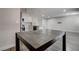 Open-concept kitchen and dining area with modern finishes and ample space at 7905 Idledale Ct # 102, Las Vegas, NV 89145