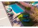 Aerial view of a sparkling pool and lounge area in a private backyard at 8137 Cape Flattery Ave, Las Vegas, NV 89147