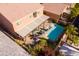 Aerial view of a private backyard with a refreshing pool and covered patio at 8137 Cape Flattery Ave, Las Vegas, NV 89147
