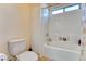 Neat bathroom featuring a tub with a shower and a standard toilet at 8137 Cape Flattery Ave, Las Vegas, NV 89147