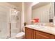 Bathroom with shower and glass door, with an ample vanity and sink at 8137 Cape Flattery Ave, Las Vegas, NV 89147