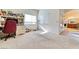 Bright bedroom with carpet floors, two windows, and an abundance of natural light at 8137 Cape Flattery Ave, Las Vegas, NV 89147