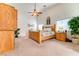 Cozy bedroom with hardwood furniture, carpet floors and a charming cottagecore design at 8137 Cape Flattery Ave, Las Vegas, NV 89147
