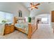 Light-filled bedroom with a blend of carpet floors and views of an adjacent space at 8137 Cape Flattery Ave, Las Vegas, NV 89147