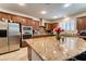 Well-equipped kitchen featuring stainless steel appliances, granite countertops, and ample cabinet space at 8137 Cape Flattery Ave, Las Vegas, NV 89147