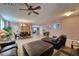Spacious living room and dining area featuring tile flooring and natural light at 8137 Cape Flattery Ave, Las Vegas, NV 89147