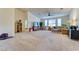 Wide view of living room with lots of natural light, comfortable seating, and ample space at 8137 Cape Flattery Ave, Las Vegas, NV 89147
