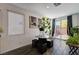 Cozy dining area with a table, stools, and sliding glass doors to the backyard at 8164 Golden Cholla Ave, Las Vegas, NV 89179