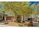 Charming two-story home featuring a well-maintained front yard and a two-car garage at 8164 Golden Cholla Ave, Las Vegas, NV 89179
