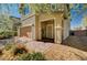 Charming two-story home featuring a well-maintained front yard and a two-car garage at 8164 Golden Cholla Ave, Las Vegas, NV 89179