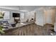 Comfortable living room with a modern sectional sofa and contemporary decor at 8164 Golden Cholla Ave, Las Vegas, NV 89179