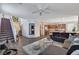 Spacious living room with staircase to the second floor and modern open floor plan at 8164 Golden Cholla Ave, Las Vegas, NV 89179