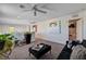 Spacious loft featuring vibrant artwork, comfortable seating, and an open design for a relaxed living space at 8164 Golden Cholla Ave, Las Vegas, NV 89179
