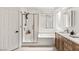 Modern bathroom features a walk-in glass enclosed shower and updated vanity at 8317 Fritzen Ave, Las Vegas, NV 89131