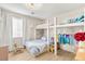 bedroom featuring bunk beds, play space, and charming decor at 8317 Fritzen Ave, Las Vegas, NV 89131