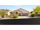 Charming one-story home featuring a two-car garage and desert landscaping at 8317 Fritzen Ave, Las Vegas, NV 89131