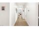 Bright hallway with clean lines and access to various rooms, offering a seamless flow throughout the home at 8317 Fritzen Ave, Las Vegas, NV 89131